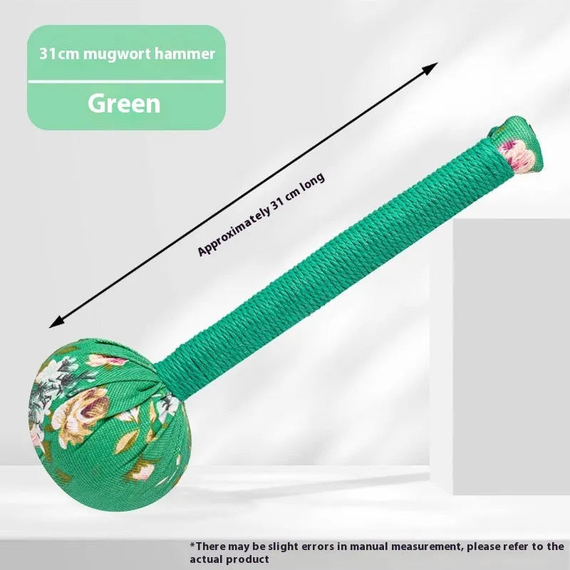 Argy wormwood handheld massage hammer in green colour on a plain background
