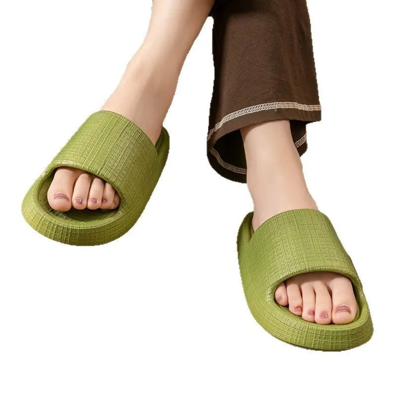 A pair of EVA toe ring slippers in a chosen colour, showing the soft non-slip sole and strap design.