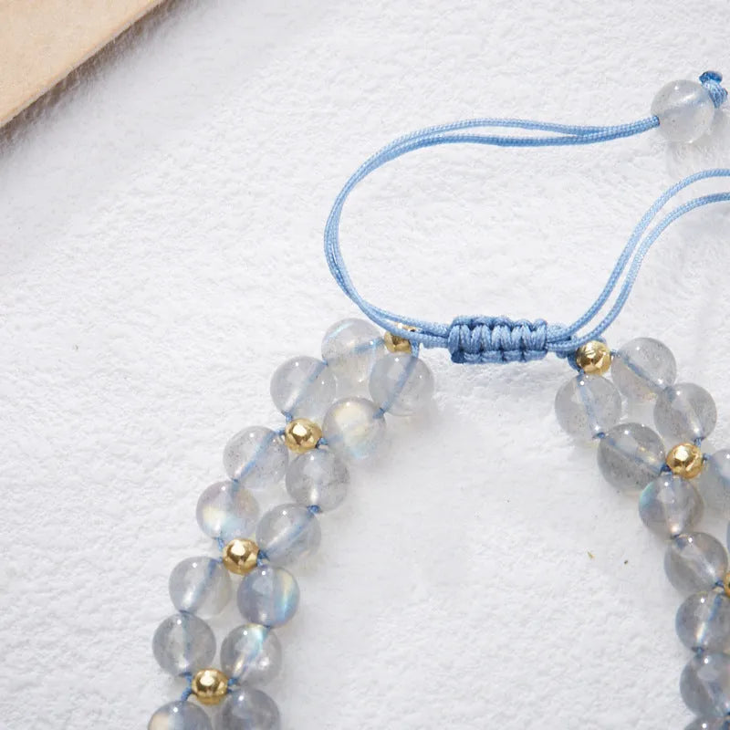 Gray moonstone bracelet with butterfly woven rope design and geometric retro styling
