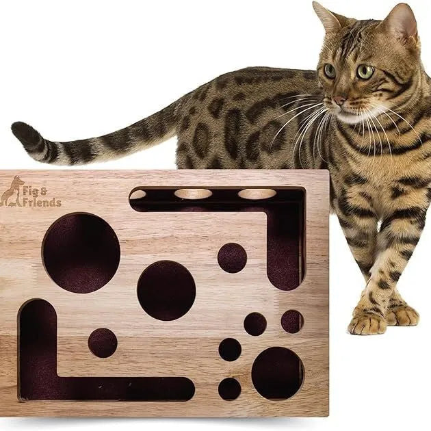 Solid wood square maze cat toy in natural wood colour on floor