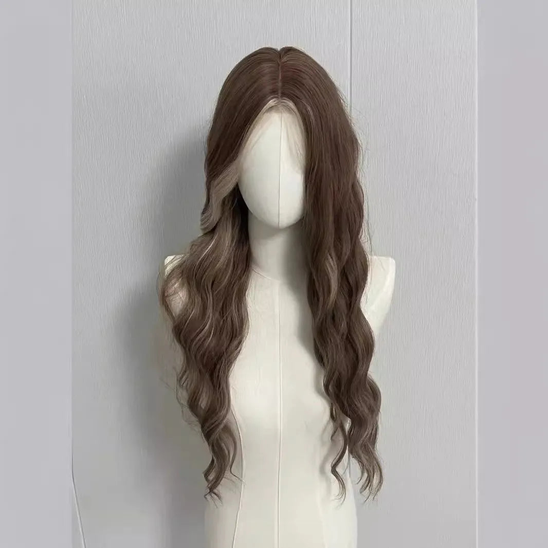 Long curly synthetic wig in grey gold colour with highlights and lace front.