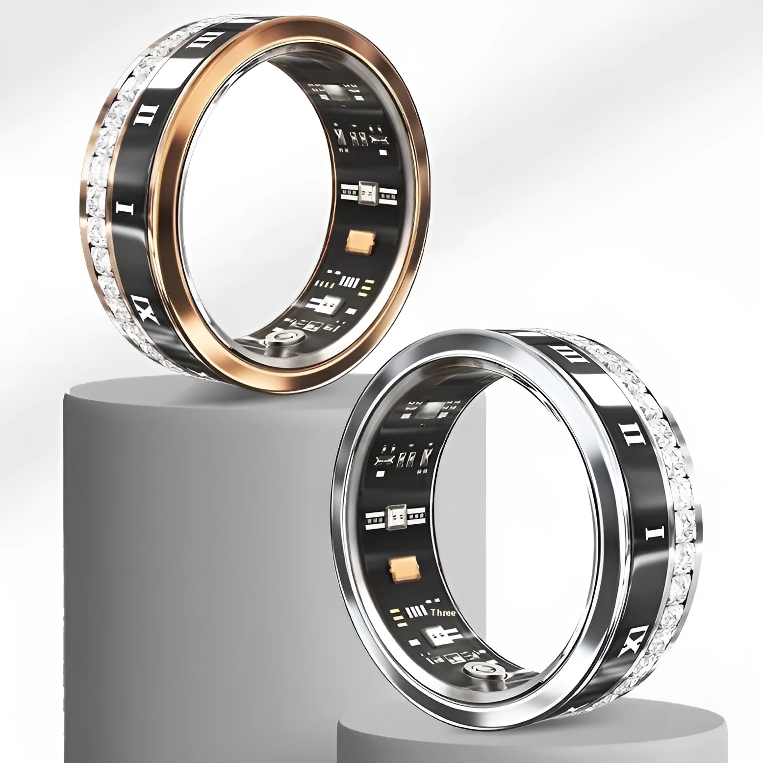 Diamond-inlaid smart ring in silver and gold colours on finger, showing health monitoring display.