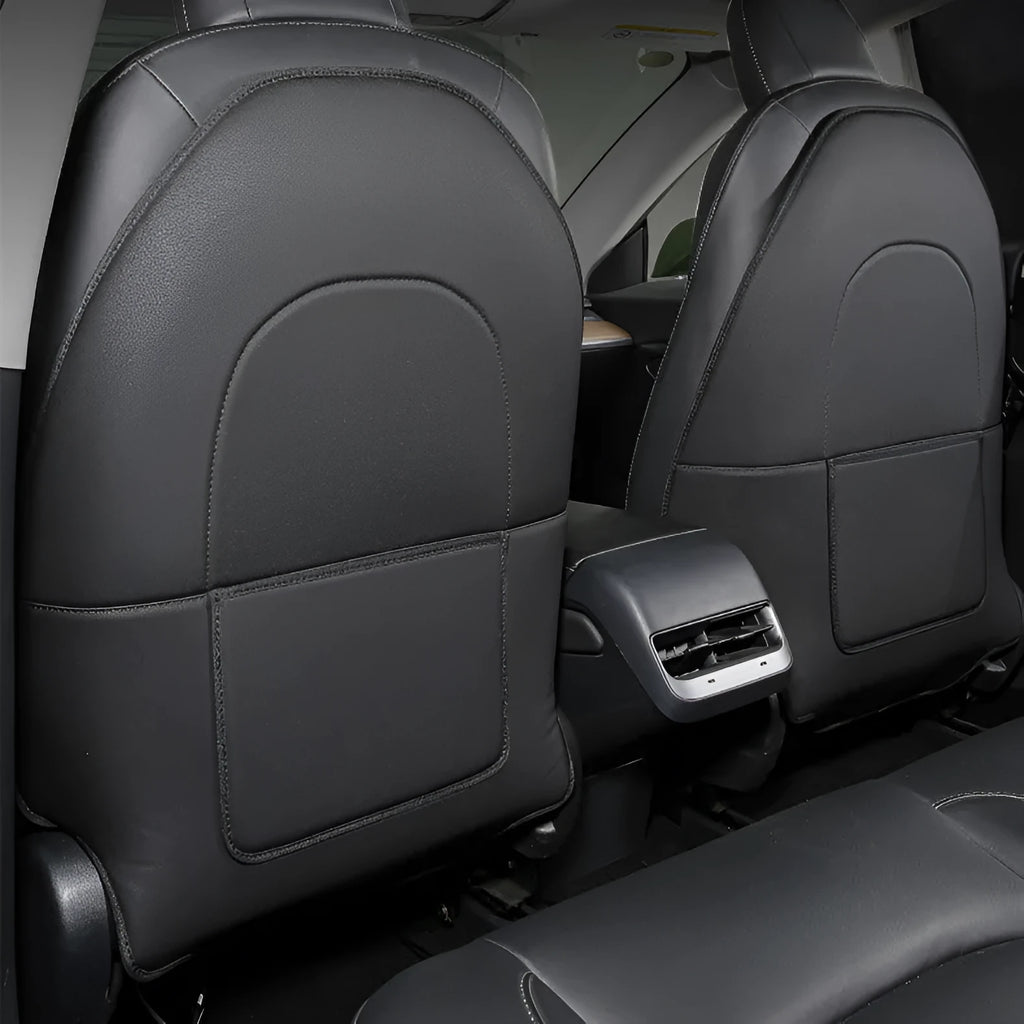Two black leather rear seat anti kick pads showing full coverage design and single pocket style.