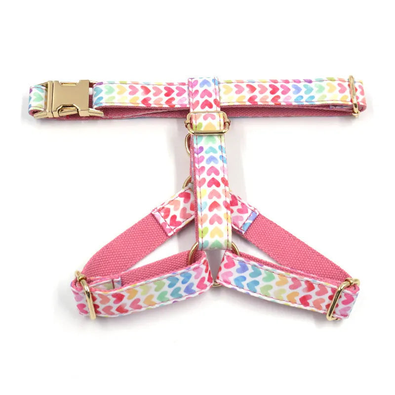 Pink dog harness with gold buckle and heart-shaped stone decoration for small dogs