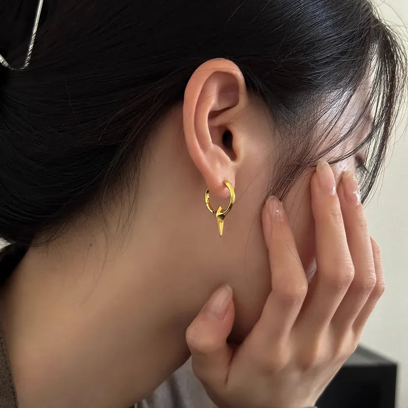 Geometric star-shaped ear clips for women with white gold plating in platinum colour