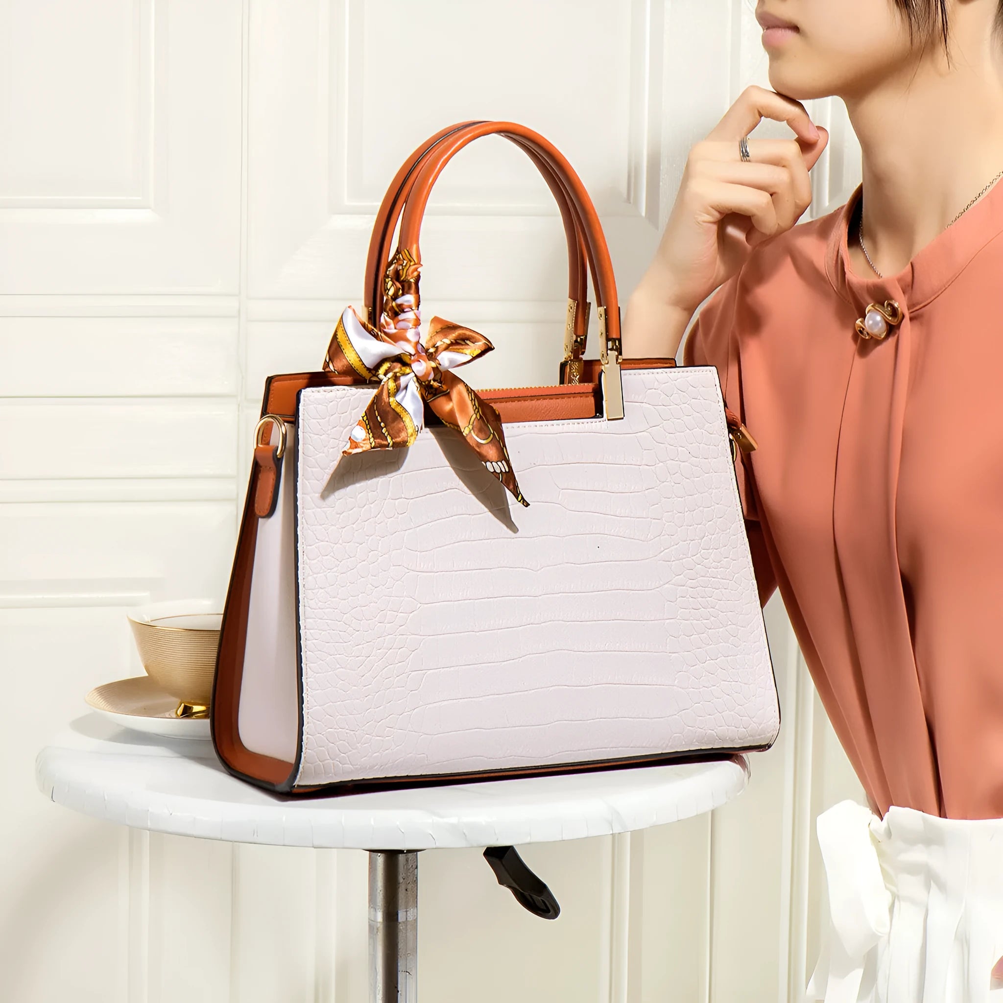 Milky white women's large-capacity PU shoulder handbag with sewing lines and multiple compartments.