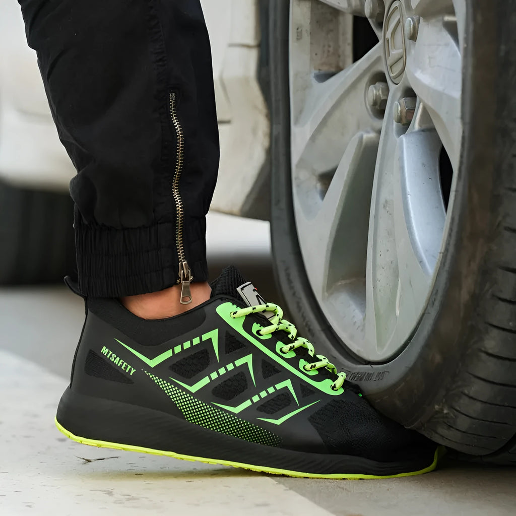 Black lace-up safety shoes with flat knitted uppers and a rubber sole, featuring a steel toe cap.