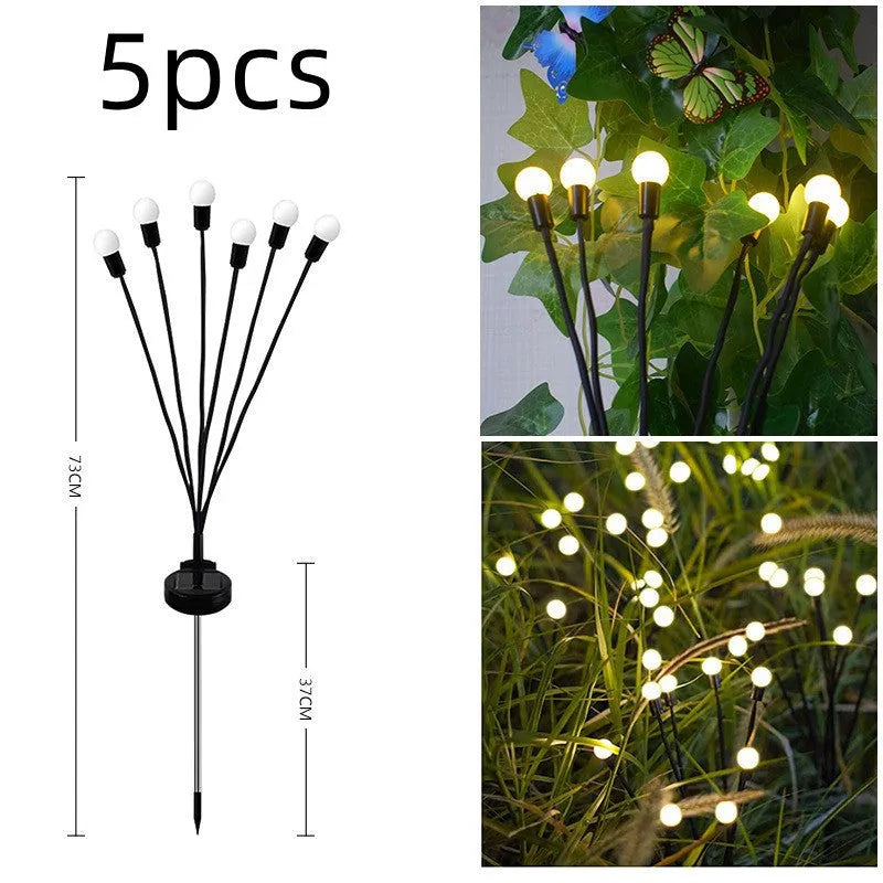 Solar-powered LED garden light with multiple heads on stainless steel ground spikes