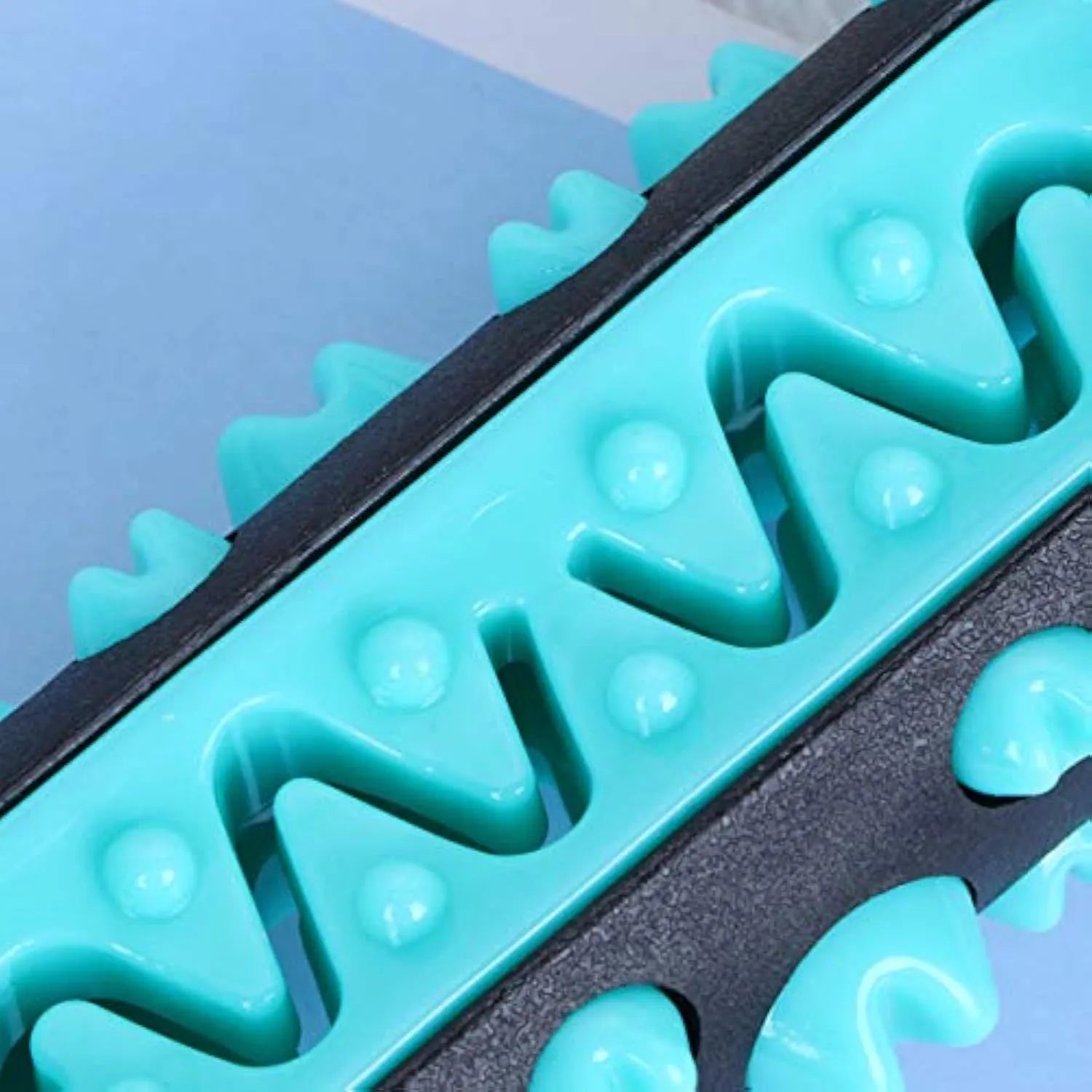 Natural rubber dog toothbrush chew toy in blue, green, yellow or black-blue for dental cleaning