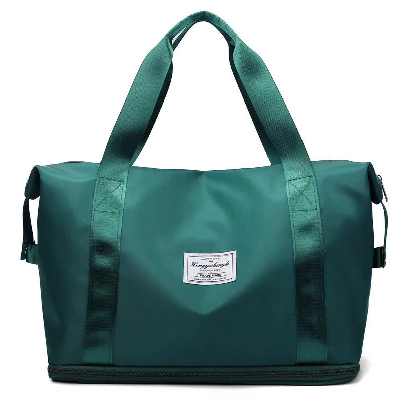 Large capacity Oxford cloth shoulder bag in lake green with multiple zippered pockets for travel