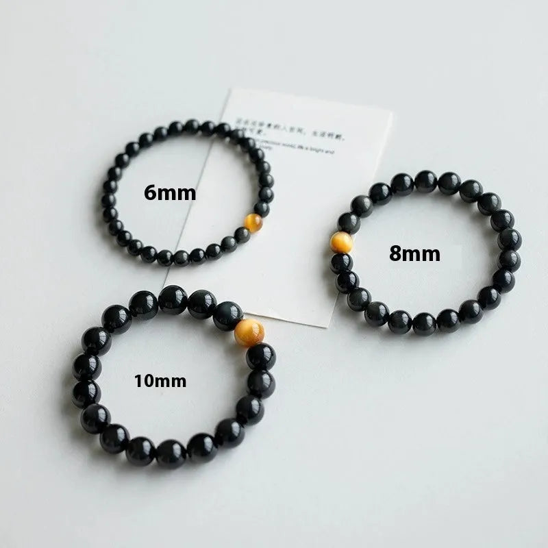 Black obsidian geometric bead bracelet in Korean style, showing size options.