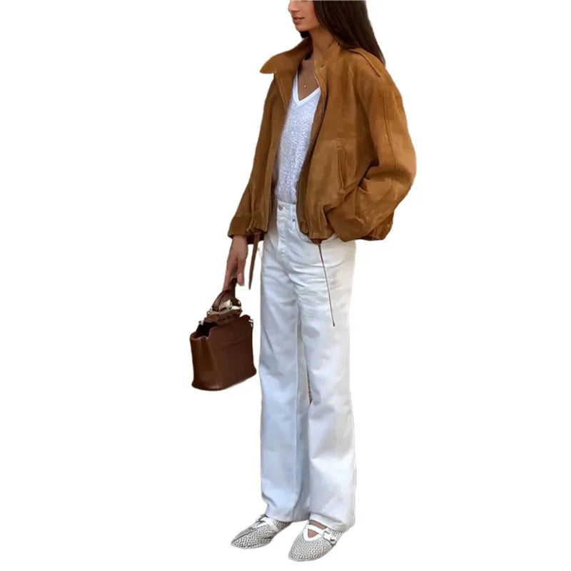 A loose-fitting solid colour long sleeve jacket on a white background.