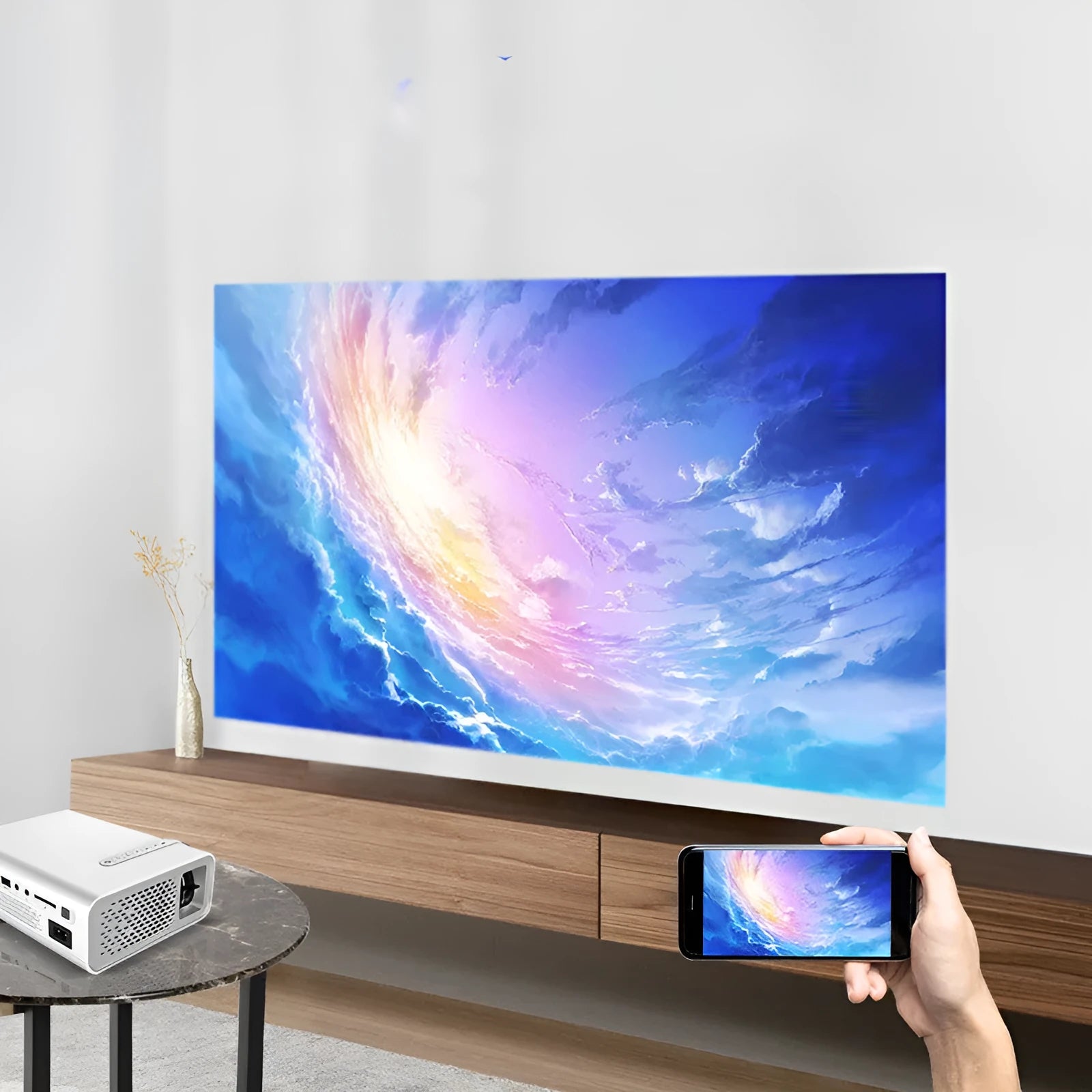 Black and white mini mobile phone projector with LED lens for wireless projection up to 138 inches.