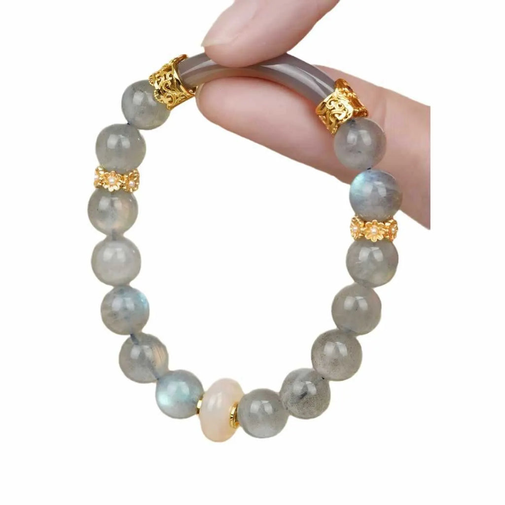 Handcrafted gray moonstone half bracelet for women with 8mm round agate beads on a wrist.