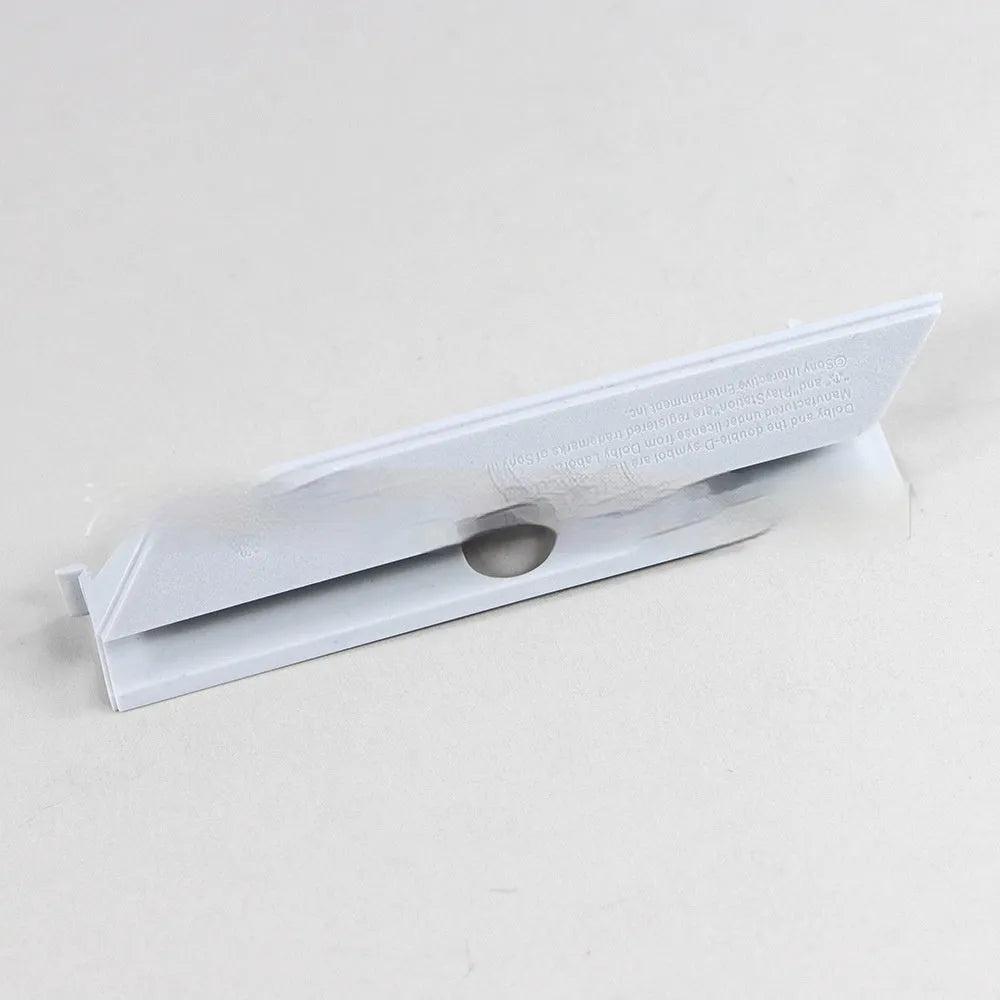 Black and white plastic hard drive cover for computer component organisation and protection