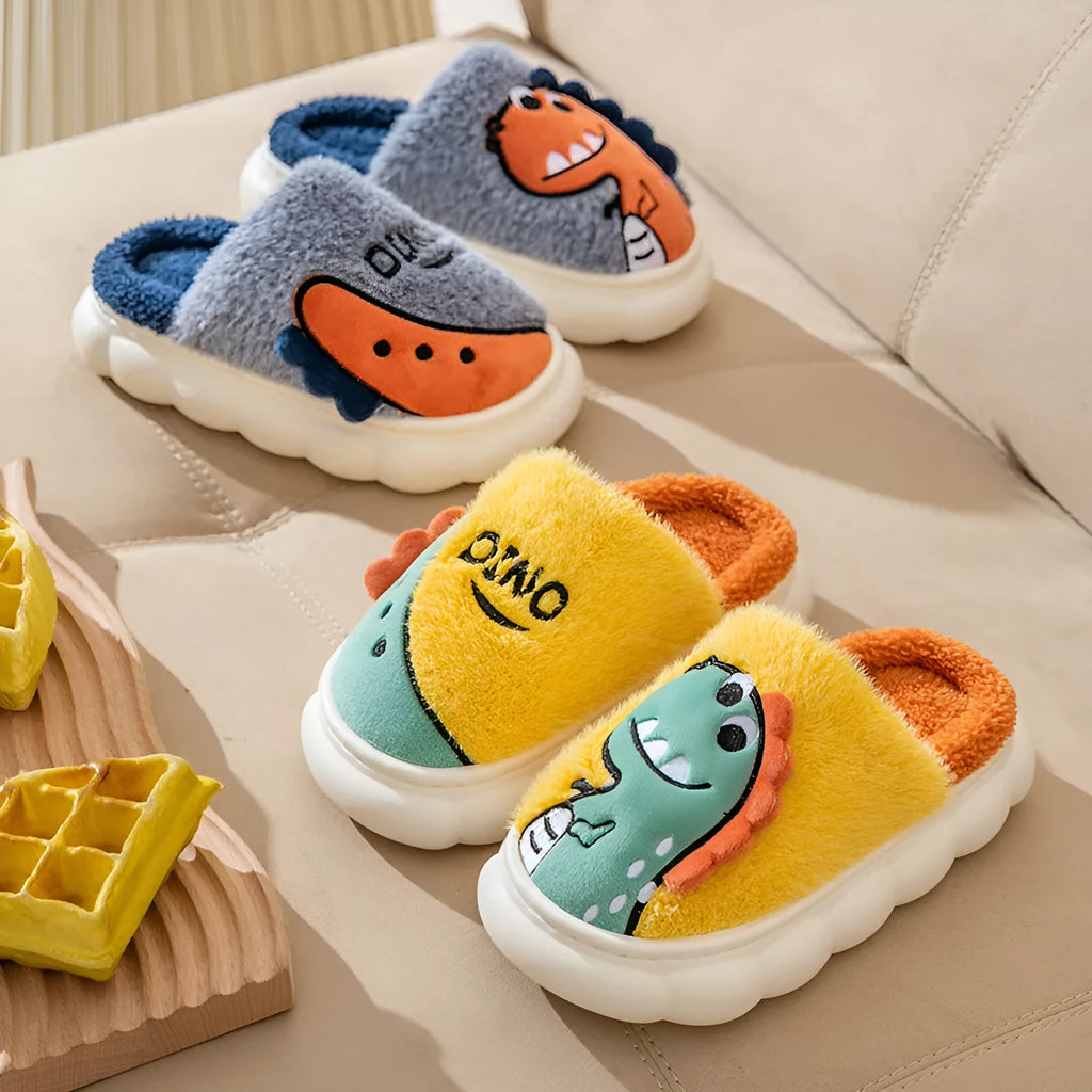 Pair of plush cotton dinosaur print slippers with a thickened sole, shown in magic grey colour.