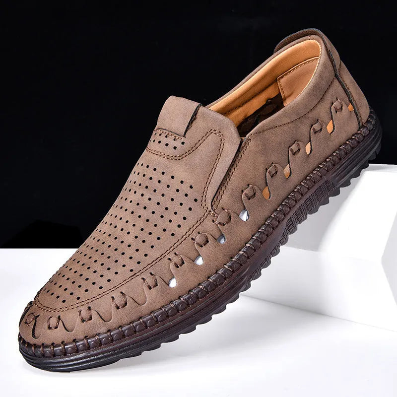 Men's brown artificial PU slip-on casual shoes with leather lining and flat sole.