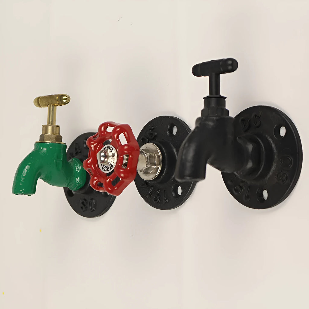 Water pipe style metal wall hook for towels on a white wall, shown in black, green, and red colour options.