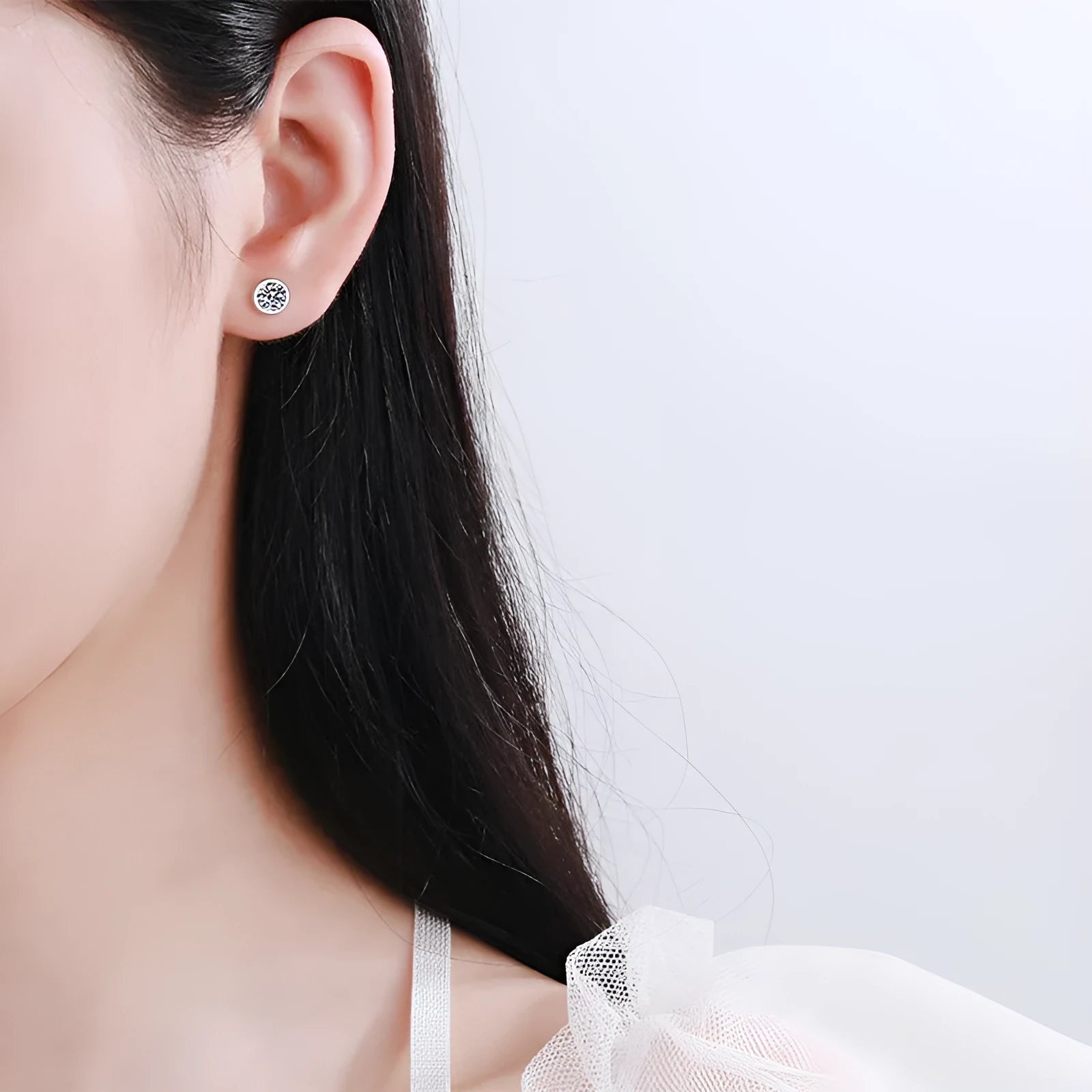 Geometric gold plated women's earrings with a moissanite stone on a 925 silver setting.