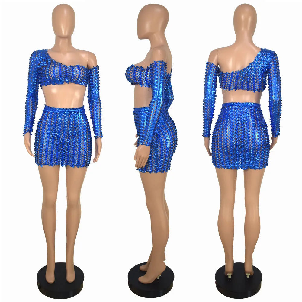 Hollow-out net two-piece dress set with sleeveless top and short skirt in polyester fabric