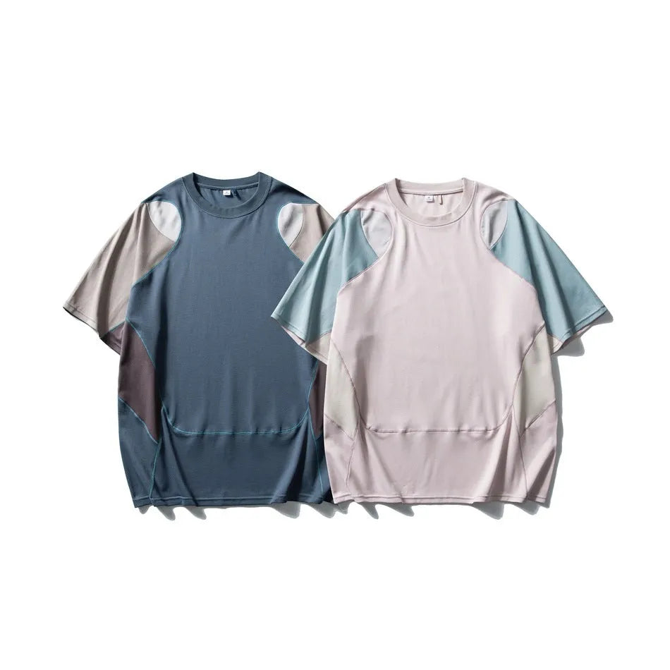 Men's loose blue t-shirt with patchwork contrast colour design and short raglan sleeves.