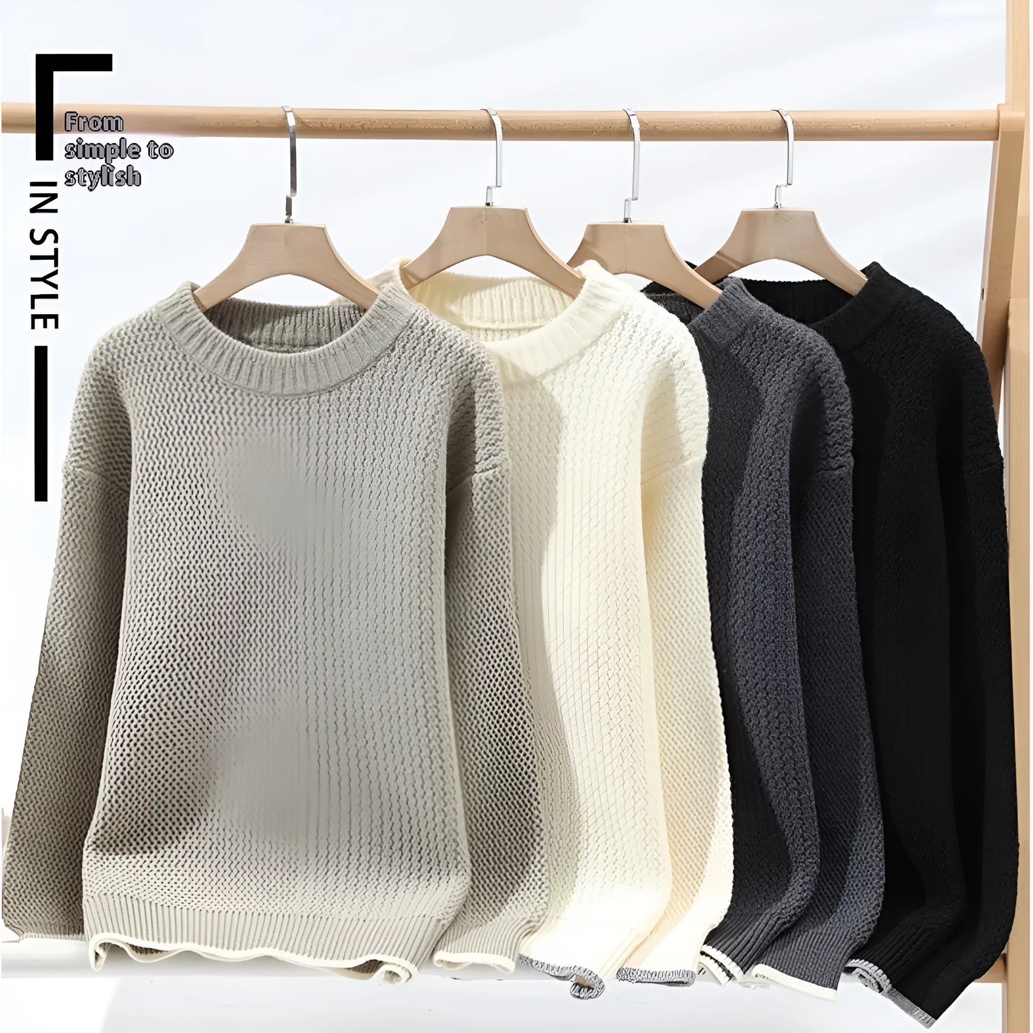 Grey loose fit men's round neck pullover sweater with long sleeves on a hanger.