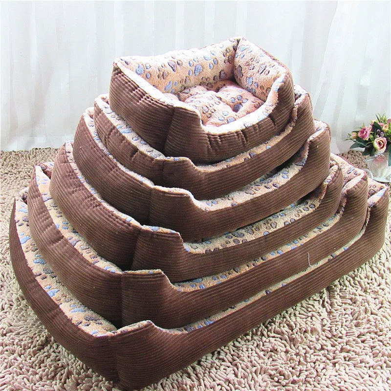 Beige plush sofa-style dog bed mat with raised sides for a small dog, shown next to size chart.