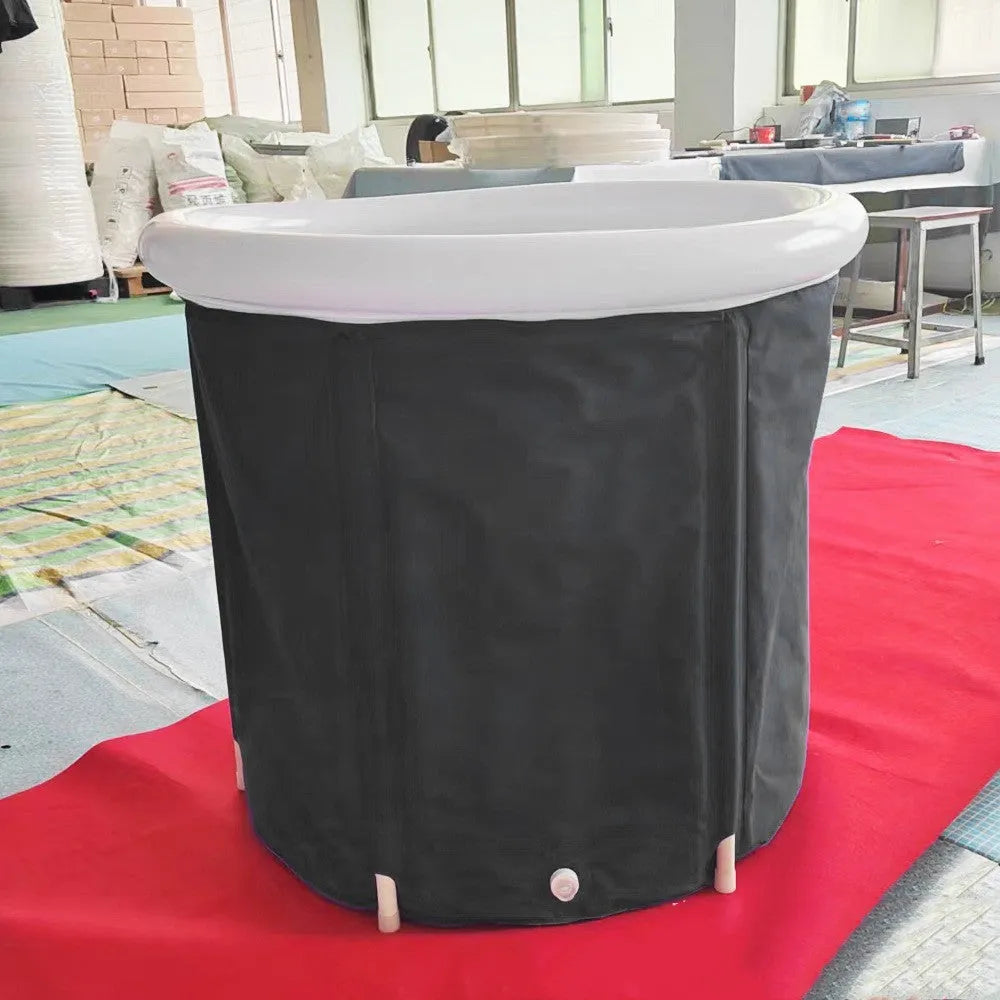 Black inflatable portable ice bath tub with weather lid and accessories for cold water therapy