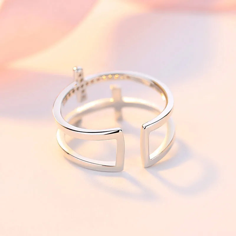 Geometric women's adjustable copper ring with zircon stone and sterling silver inlay.