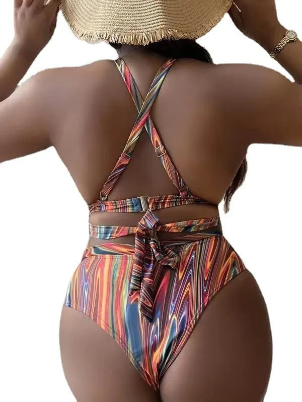 Women's floral high-waist bikini swimsuit top and pants in plus sizes.