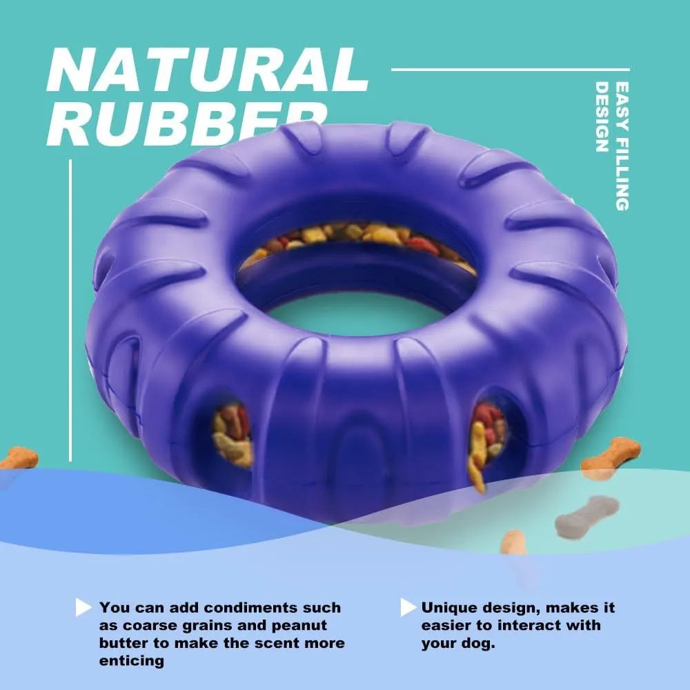Blue rubber tyre-shaped dog chew toy with oval openings, shown as a slow feeder and interactive puzzle toy