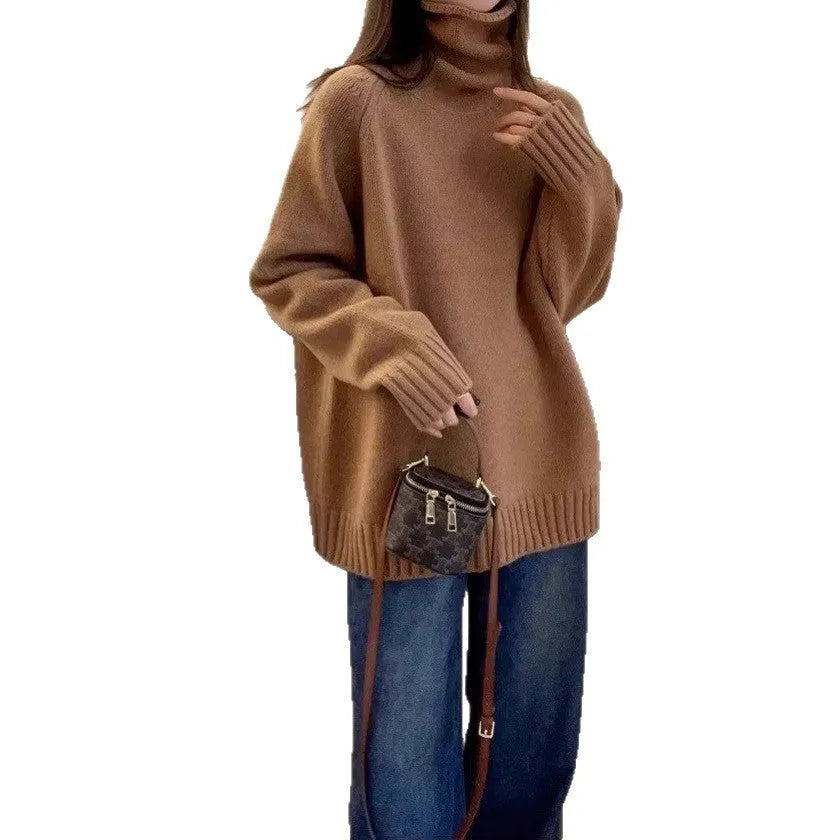 A woman wearing a loose red turtleneck sweater with a thick, curling pile collar.