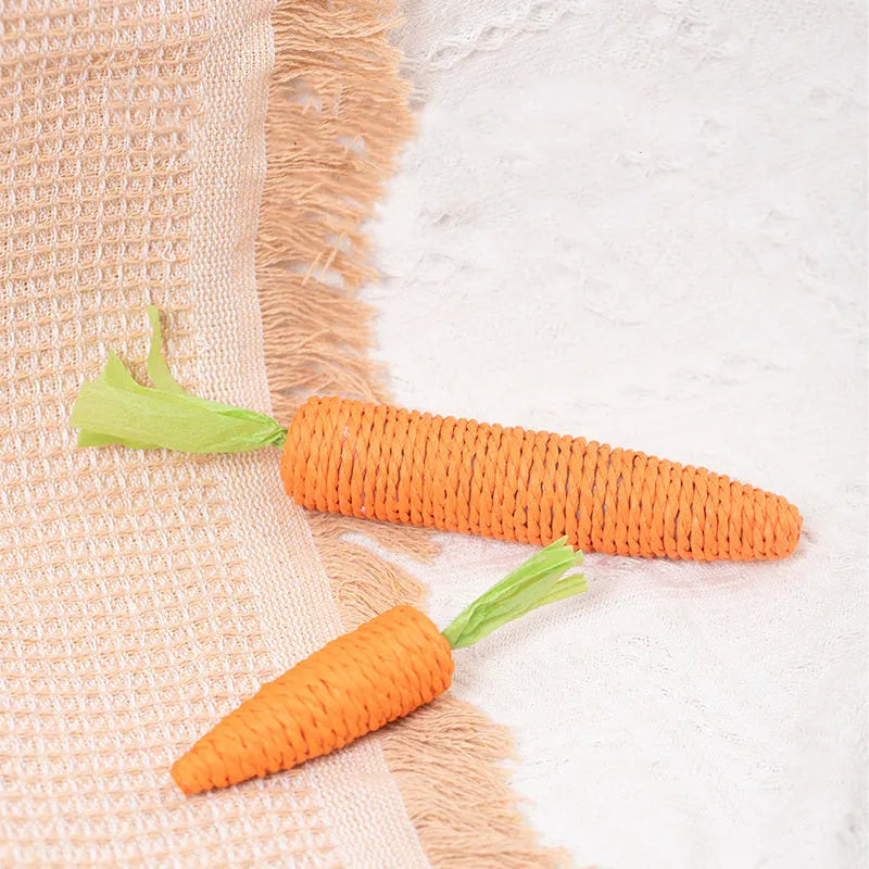 Cat toys collection showing carrot paper toys with ringing stones and tooth grinding sticks in L and S sizes