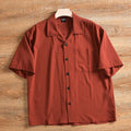 Men's lightweight grey pure cotton short sleeve shirt with a loose, cardigan-style fit.