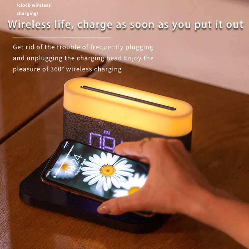 Black and white wireless desktop charger with clock display and ambient lighting functions