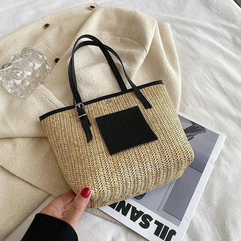 Women's woven straw shoulder bag with European retro style showing large opening and three-dimensional pockets