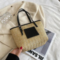 Women's woven straw shoulder bag with European retro style showing large opening and three-dimensional pockets