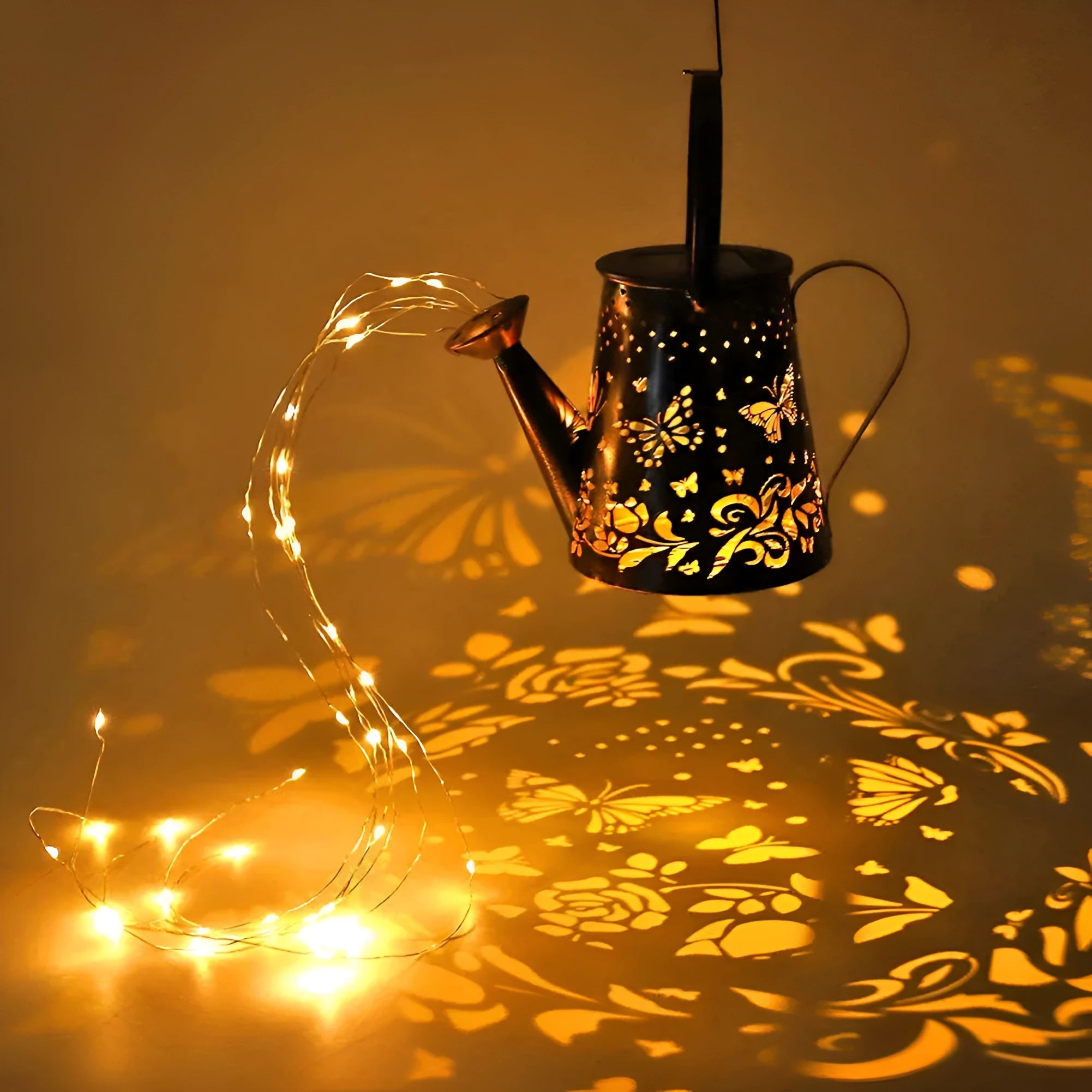 Solar-powered iron garden lamp with a tapered butterfly design emitting warm white LED light.
