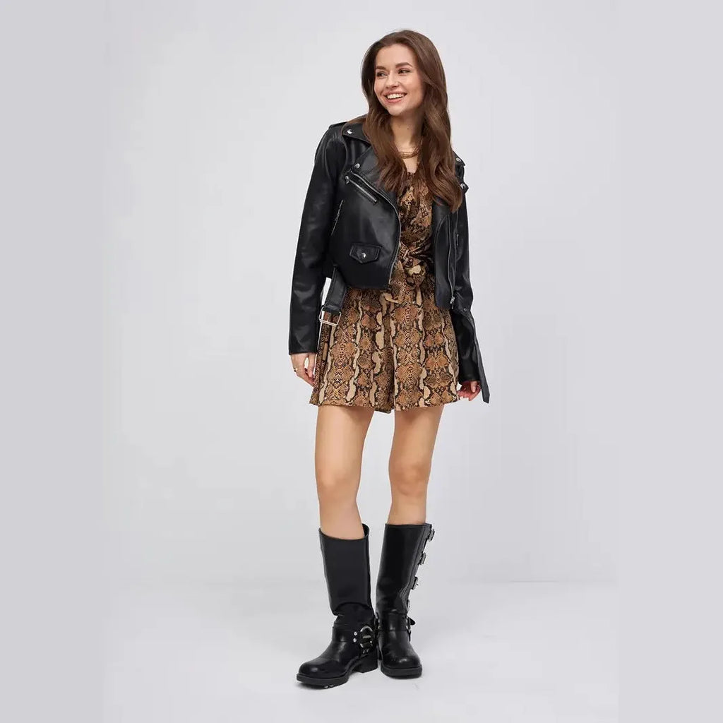 Women's black retro-style PU leather jacket with regular sleeves on a model.