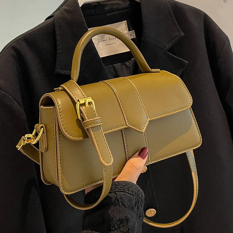 Women's beige PU leather messenger bag showing horizontal square shape and front sandwich pocket