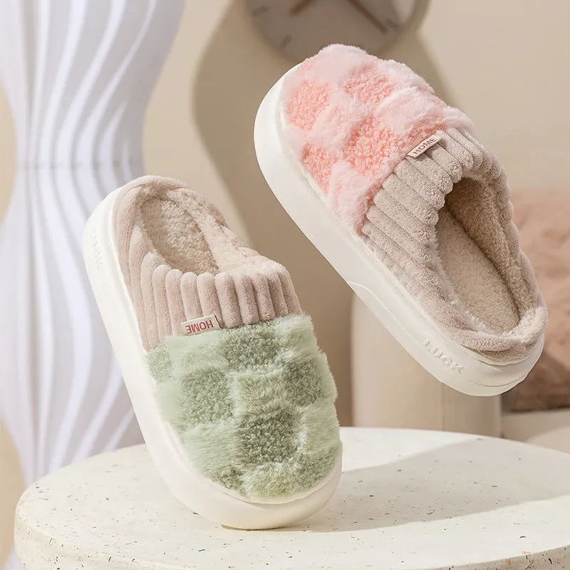 Women's plaid plush slippers in coffee colour with a soft upper, plush lining, and textured PVC sole.