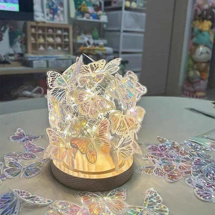 Butterfly night lamp with glass shade on raw wood base for bedside table lighting