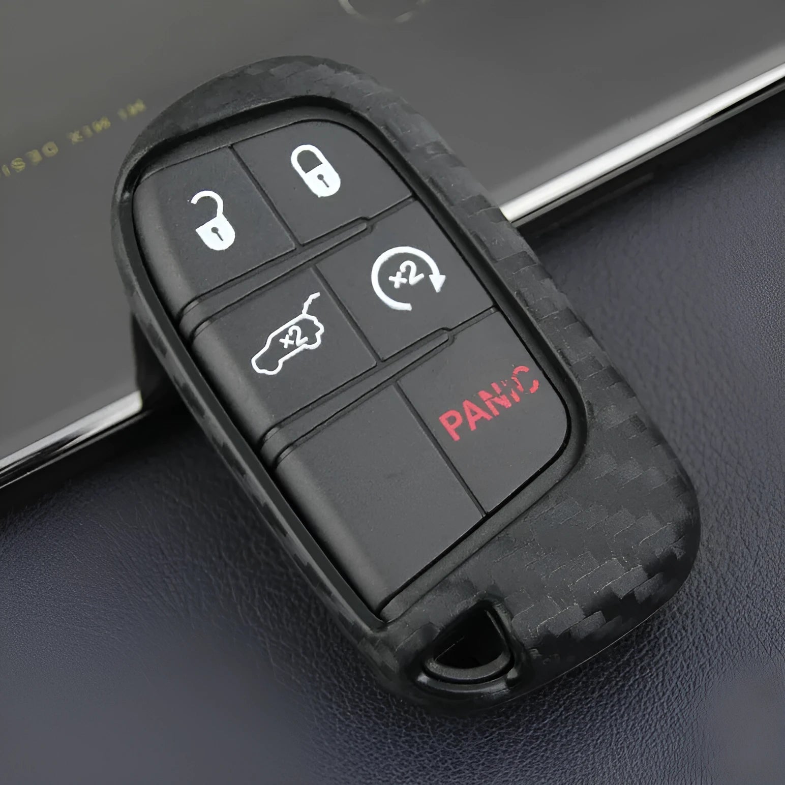 Black silicone key case with carbon fibre pattern for Dodge Chrysler Fiat remote key fobs.