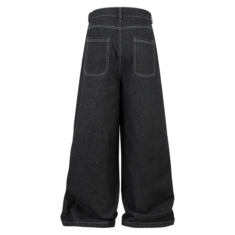 Black pleated work trousers with multiple pockets, mid waist cut, and zip fly in cotton denim fabric