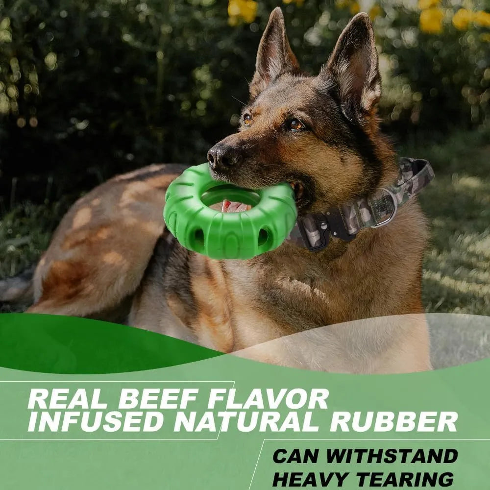 Blue rubber tyre-shaped dog chew toy with oval openings, shown as a slow feeder and interactive puzzle toy