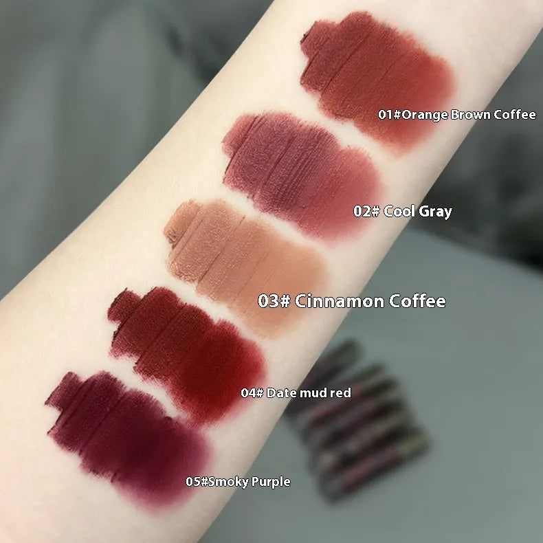 Lava Secret Matte Lip Mud Lipstick in five colours showing orange brown coffee, cool gray, cinnamon coffee, jujube red and smoked purple shades