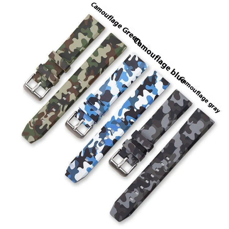 Green camouflage silicone watch strap shown detached, displaying its 20mm width and flat head lug design.