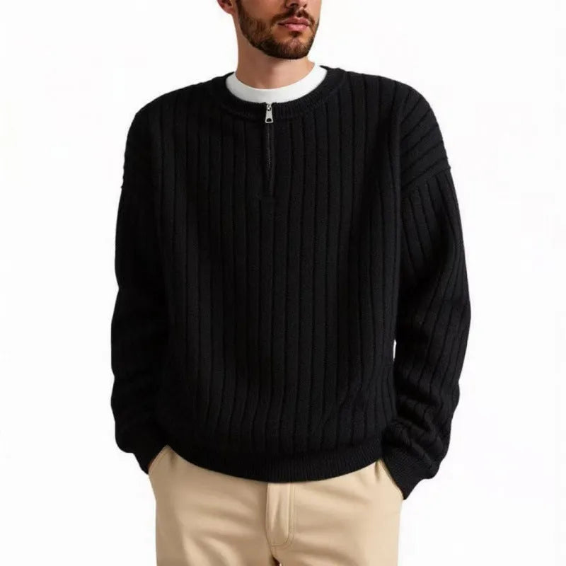 A grey men's loose fit half zip pullover sweater with a textured knit and long sleeves.