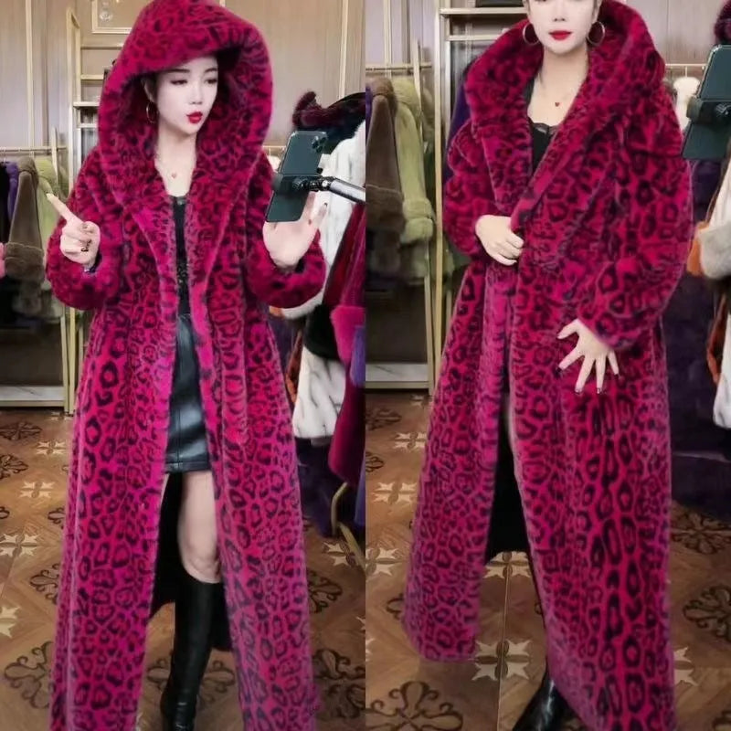 Long brown leopard print faux fur coat on a hanger, showing its loose fit and regular sleeves.