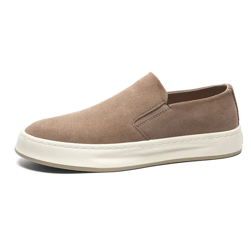 Men's grey casual shoes with round toe design and sewing line detailing showing rubber soles